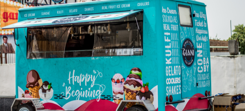 Blue and pink ice-cream food truck. 